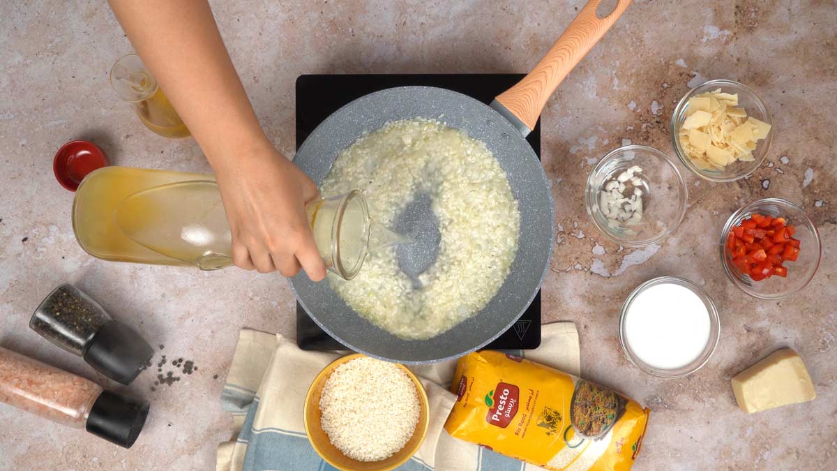 risotto lait de coco : Ajouter le bouillon