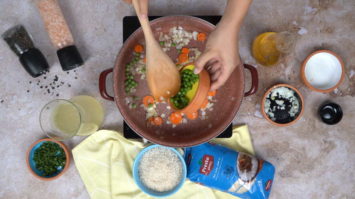 riz carotte petit pois: Ajout des petits pois